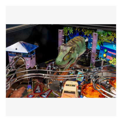 Pinball machine with dinosaur figure and colorful playfield
