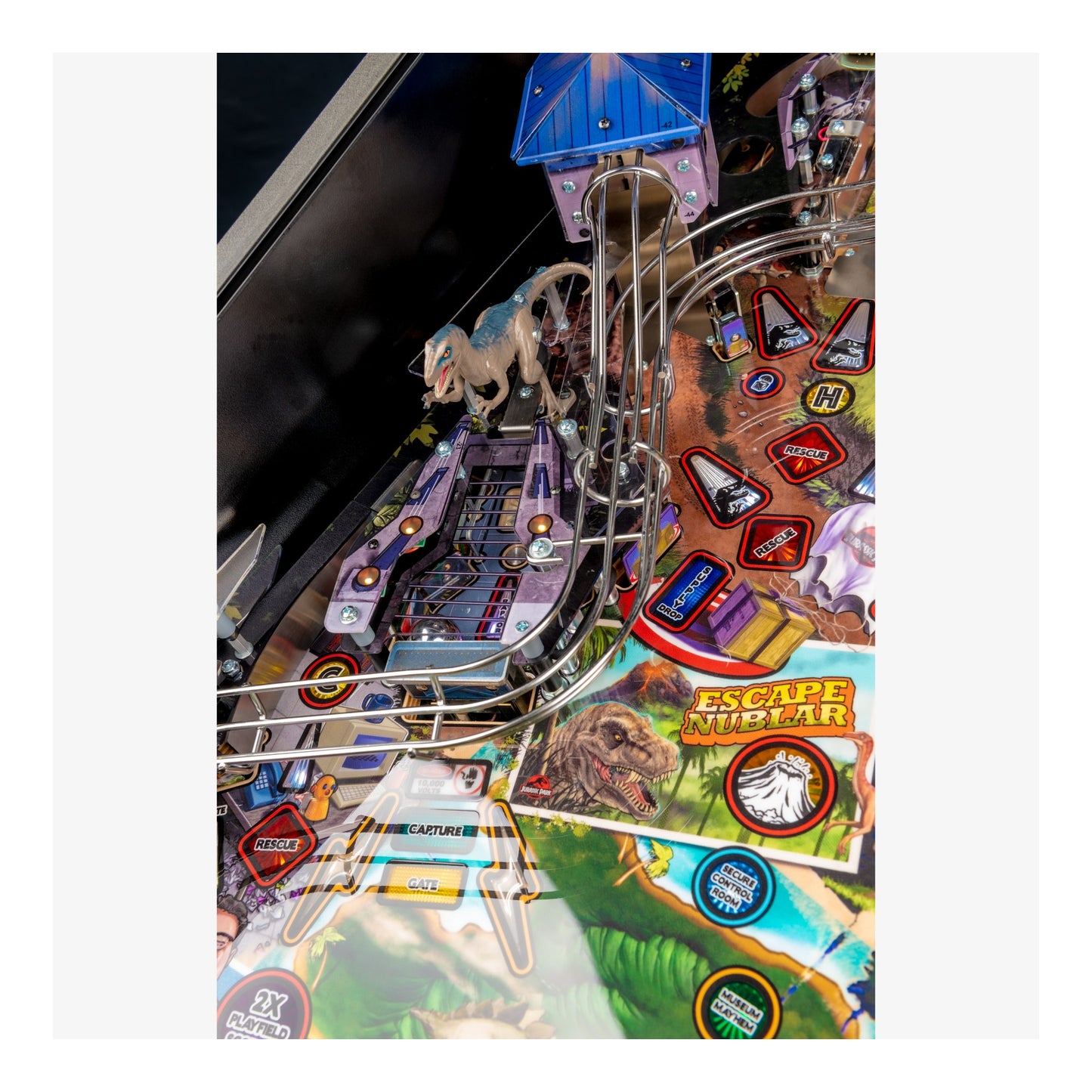 Pinball machine with 'Escape Jurassic' theme featuring dinosaurs and colorful design.