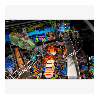 Pinball machine with dinosaur and truck design in an indoor setting