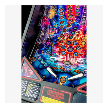 Colorful pinball machine with intricate design and 'Netflix' branding.