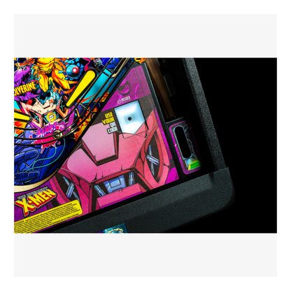 Close-up of a colorful pinball machine with vibrant graphics and text.