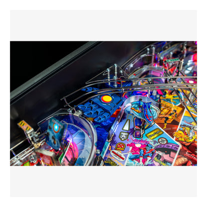 Close-up of a colorful pinball machine with various symbols and designs.