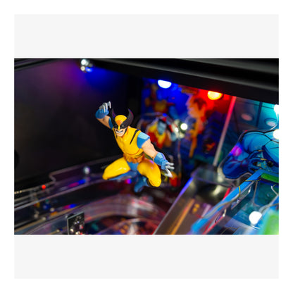 Pinball machine with superhero figure in action