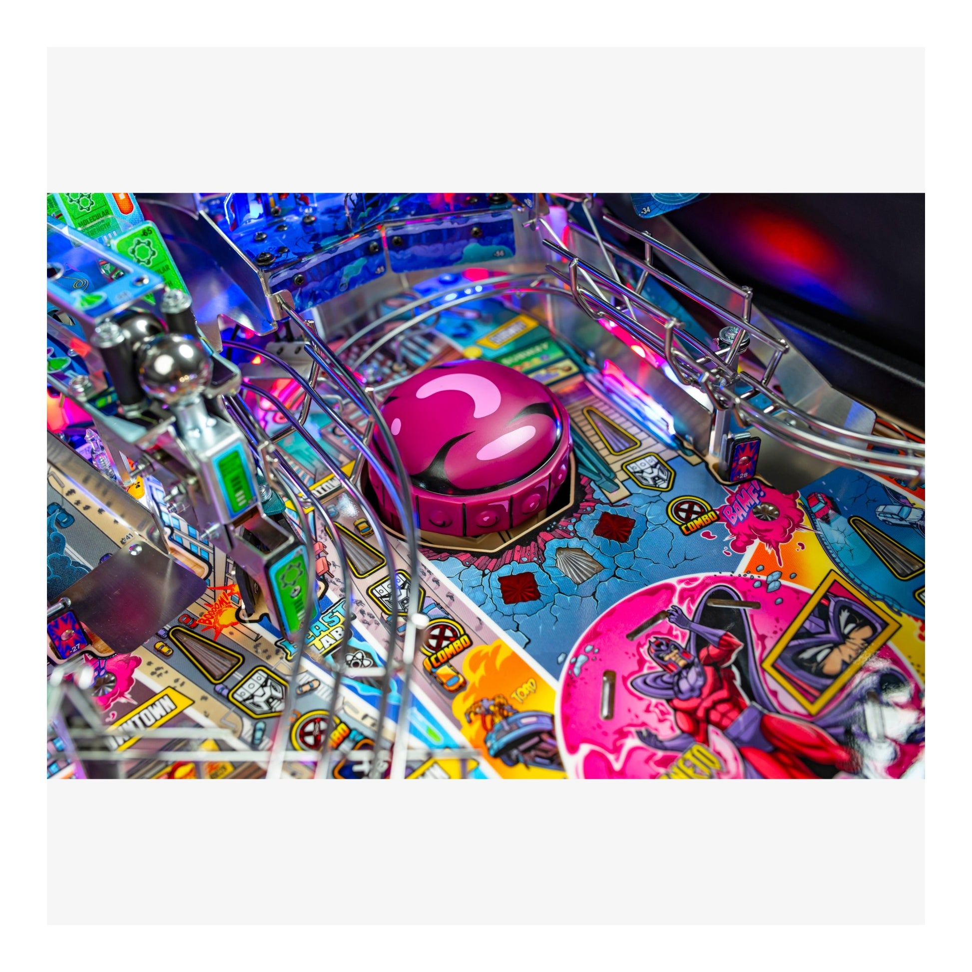 Close-up of a colorful pinball machine with vibrant graphics and bright lights.