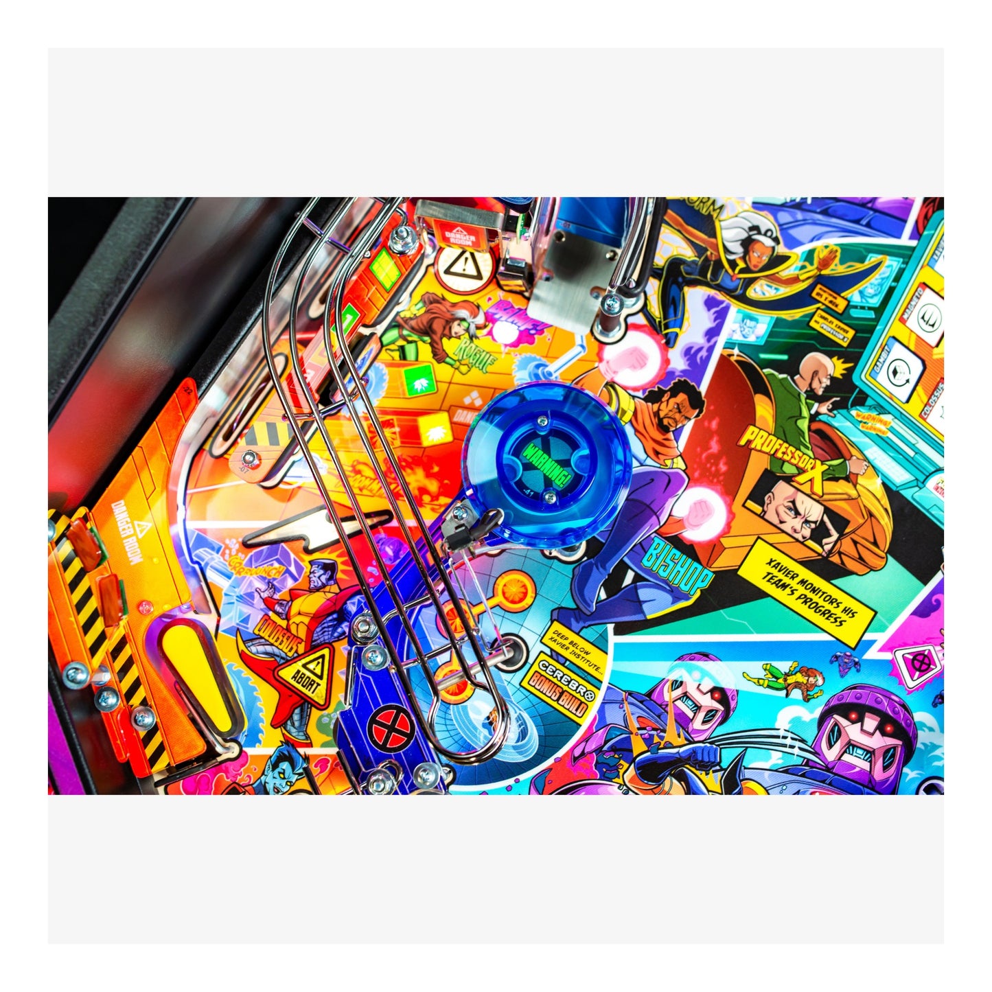 Colorful pinball machine with various characters and graphics