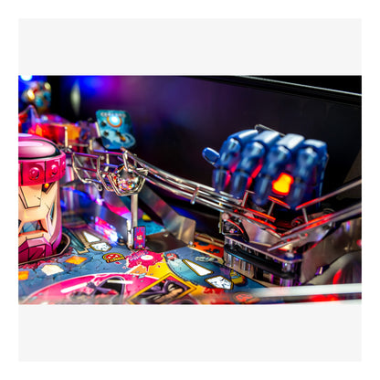 Close-up of a pinball machine with colorful lights and mechanical components.