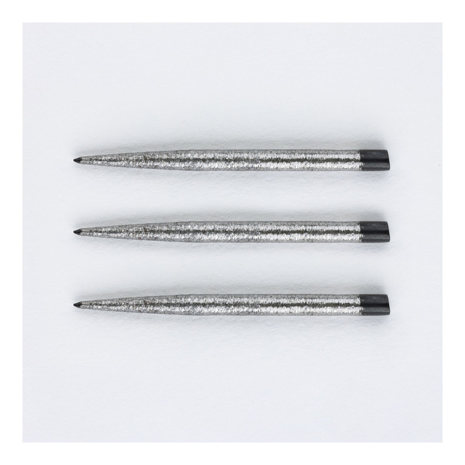 Close-up of Punk Points Delinquent standard steel dart point showing continuous finish