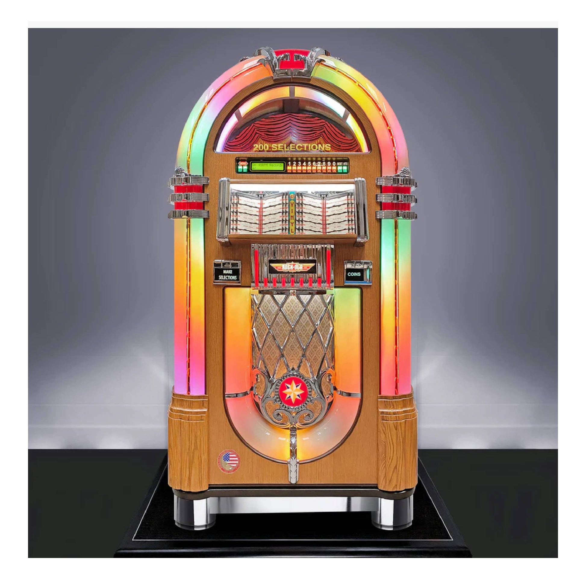 Colorful vintage-style jukebox on a dark platform with a gray background