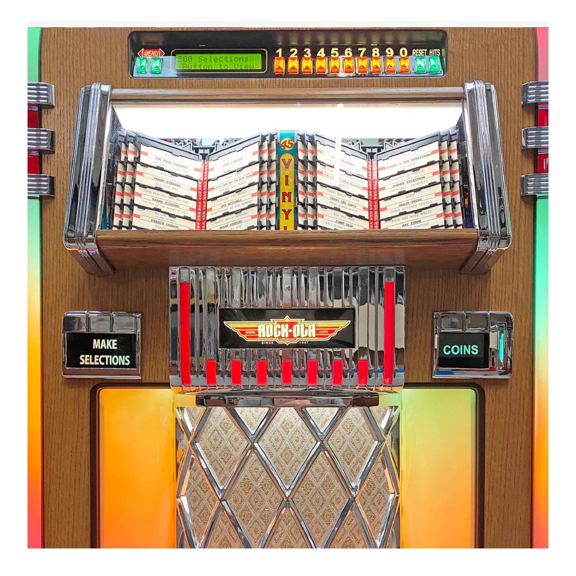 Close-up of a vintage-style jukebox with coin slot and selection buttons.