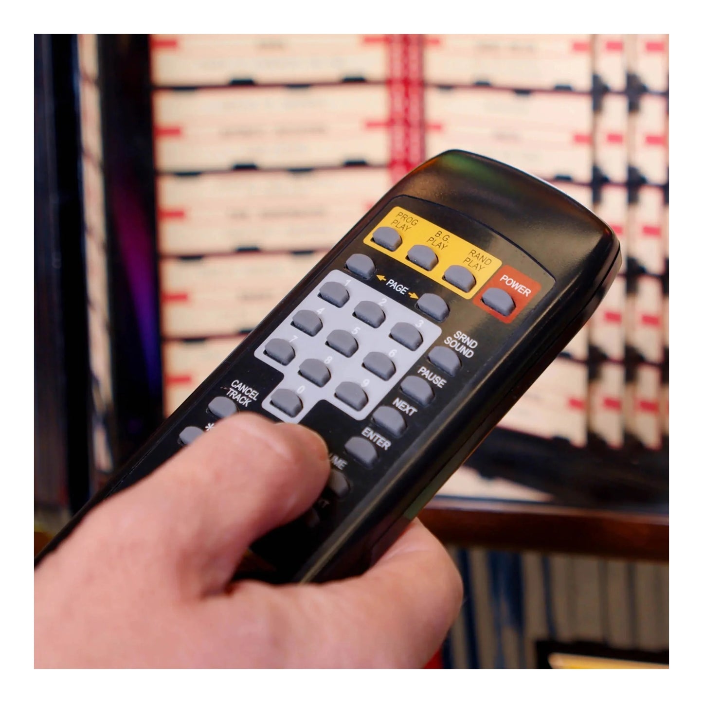 The official remote control included with the Rock-Ola CD Jukebox.