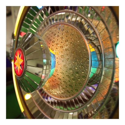 Close-up of a colorful disco ball with reflective surface