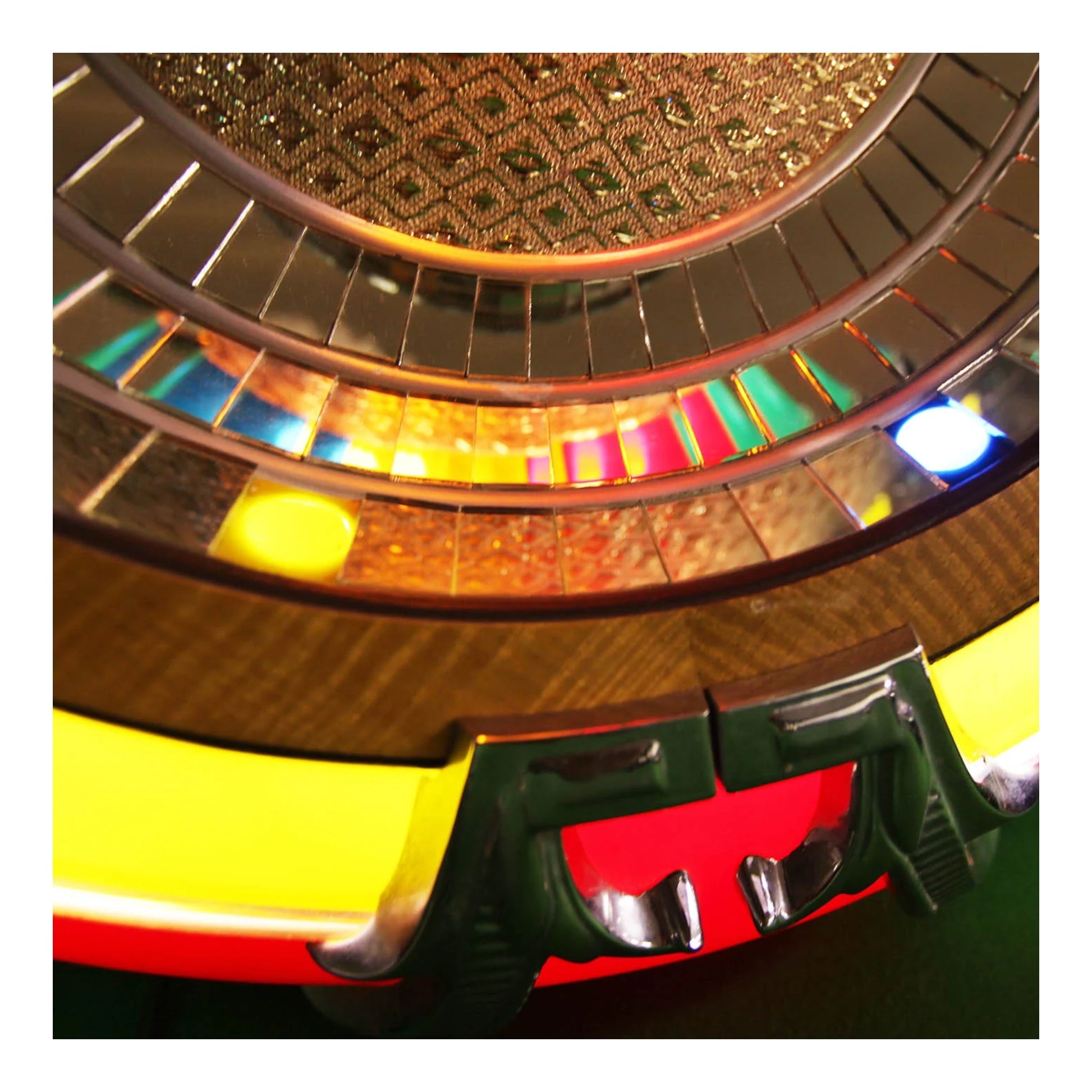 Close-up of a colorful light-up toy with a reflective surface