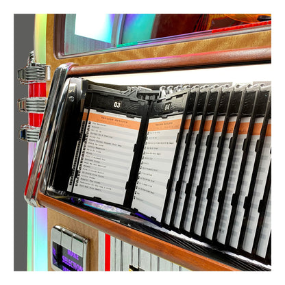 Close-up of a vintage jukebox with record slots and control panel.