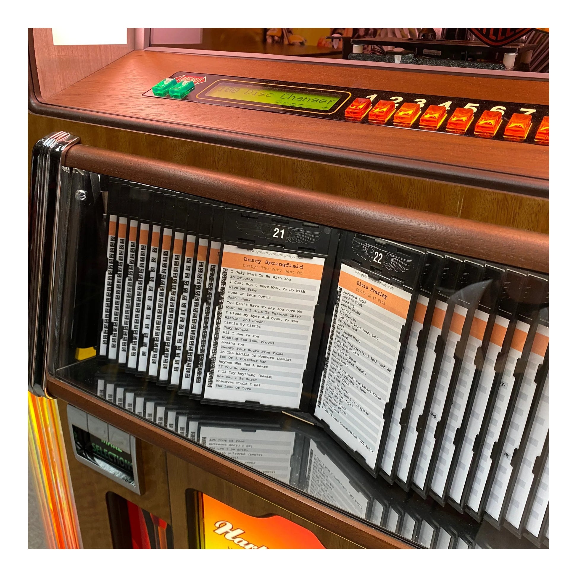 Jukebox with record sleeves and a digital display