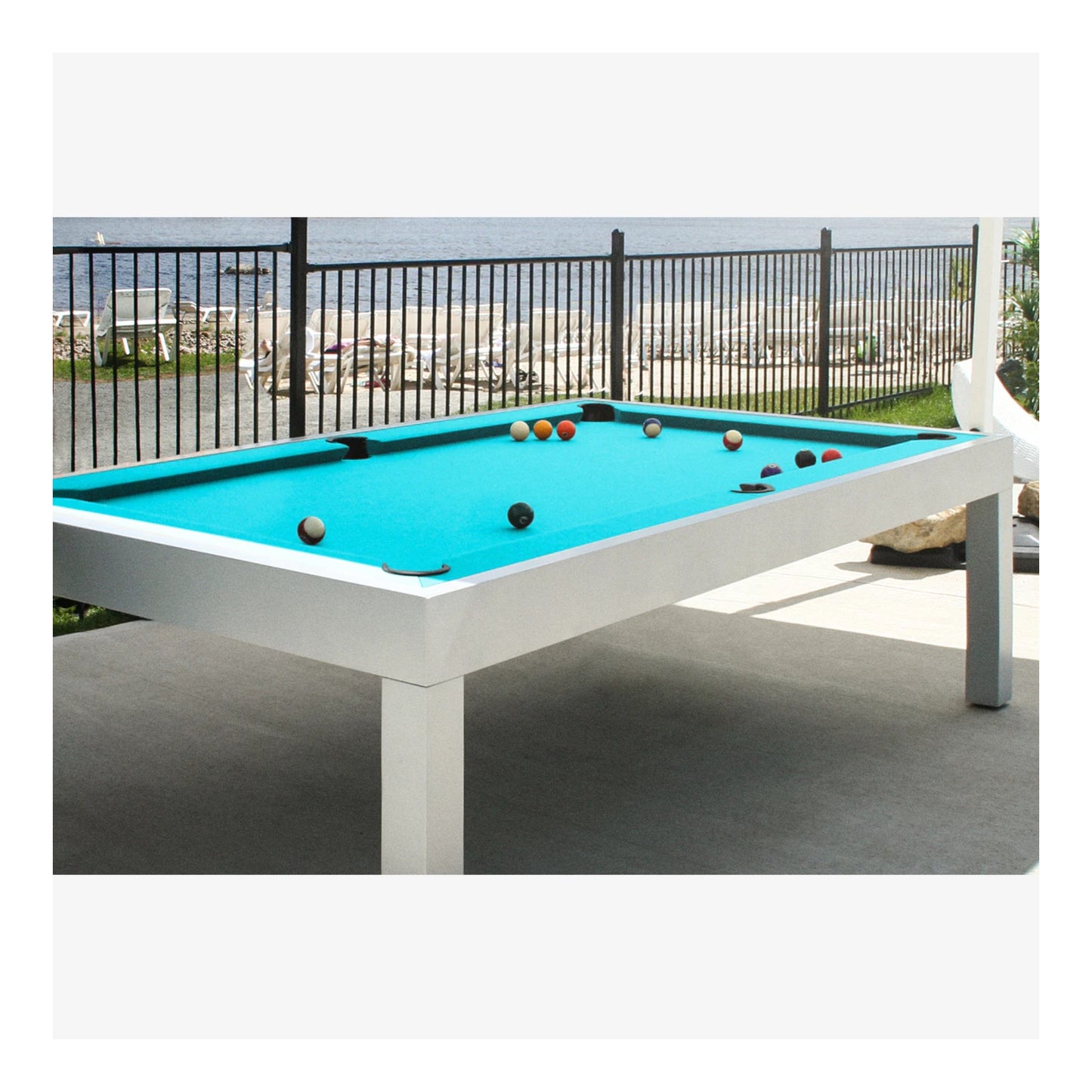 Side profile of the Storm outdoor pool table, showing the sleek aluminum leg design.