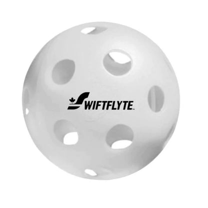Close up of yellow Swiftlyte pickleball showing precision drilled holes for indoor play