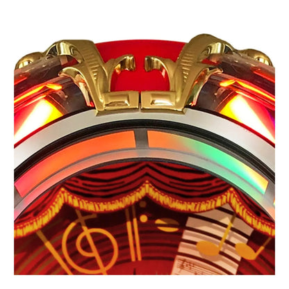 Close-up of a colorful object with gold accents on a white background