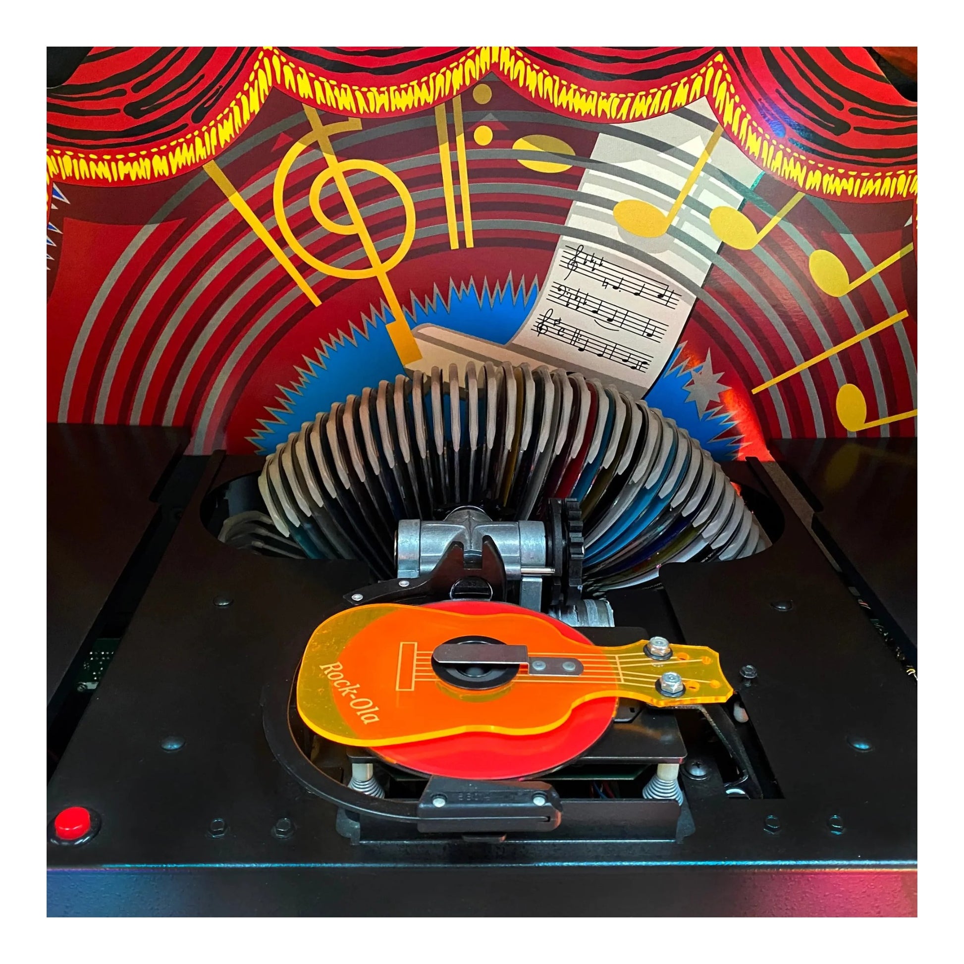 Pinball machine with guitar-shaped flyer and colorful background