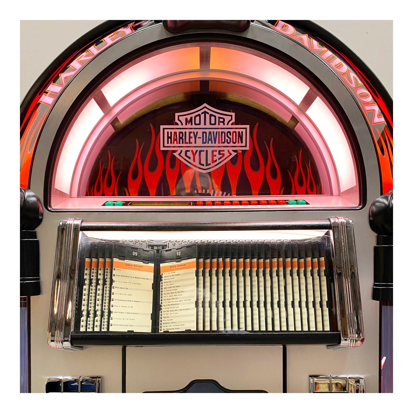 Harley-Davidson jukebox with flames and a record player.