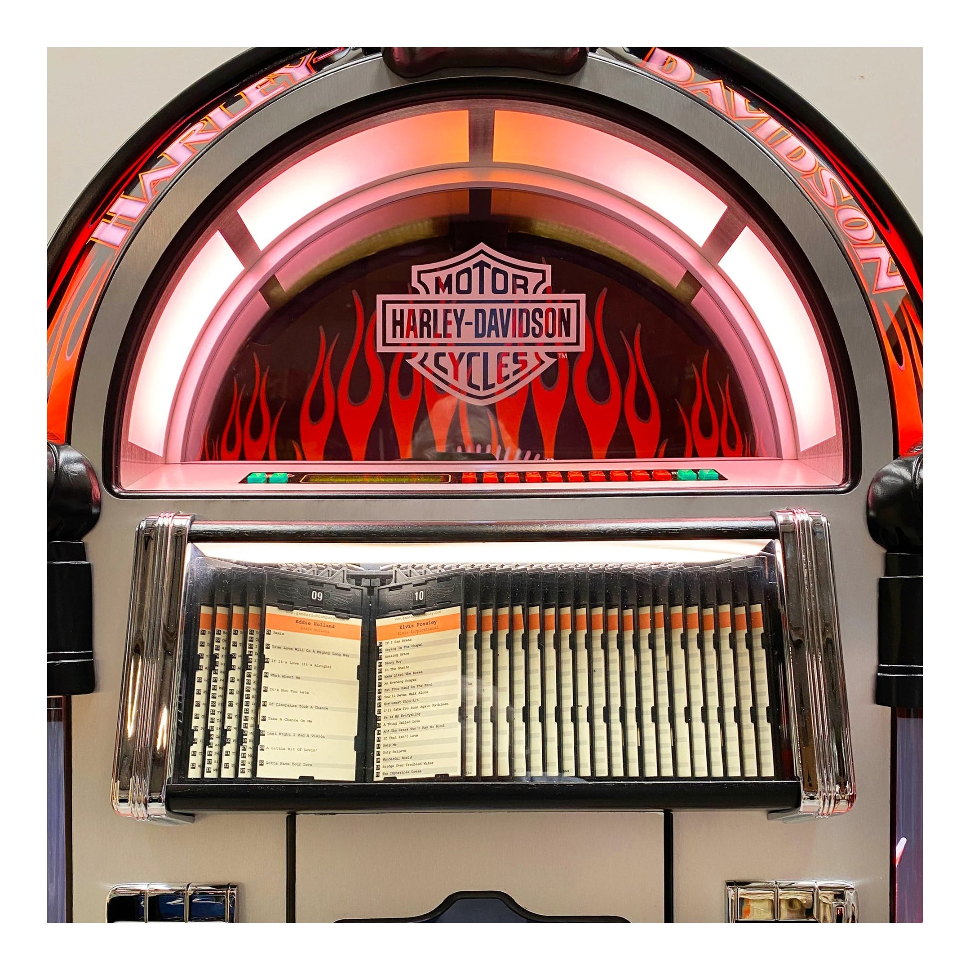Harley-Davidson jukebox with flames and a record player.