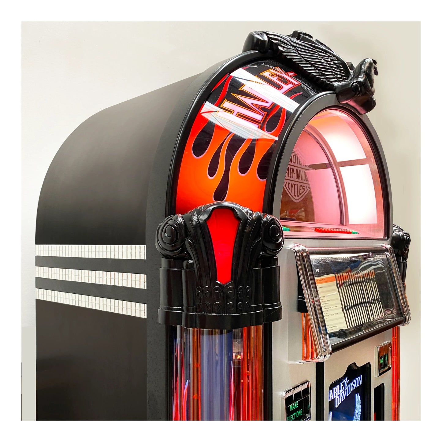 Jukebox with Harley-Davidson branding on a white background