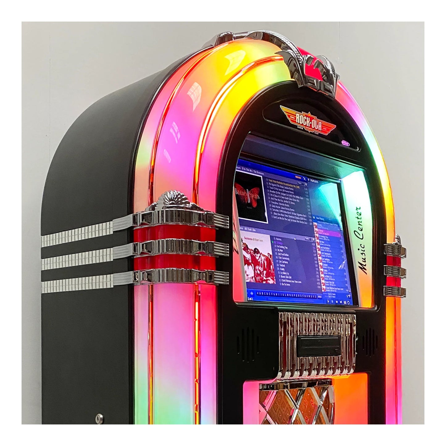 Colorful jukebox with a screen displaying music options on a gray background
