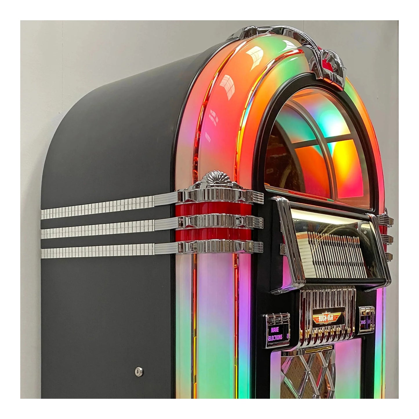 Multicolored vintage-style jukebox on a gray background