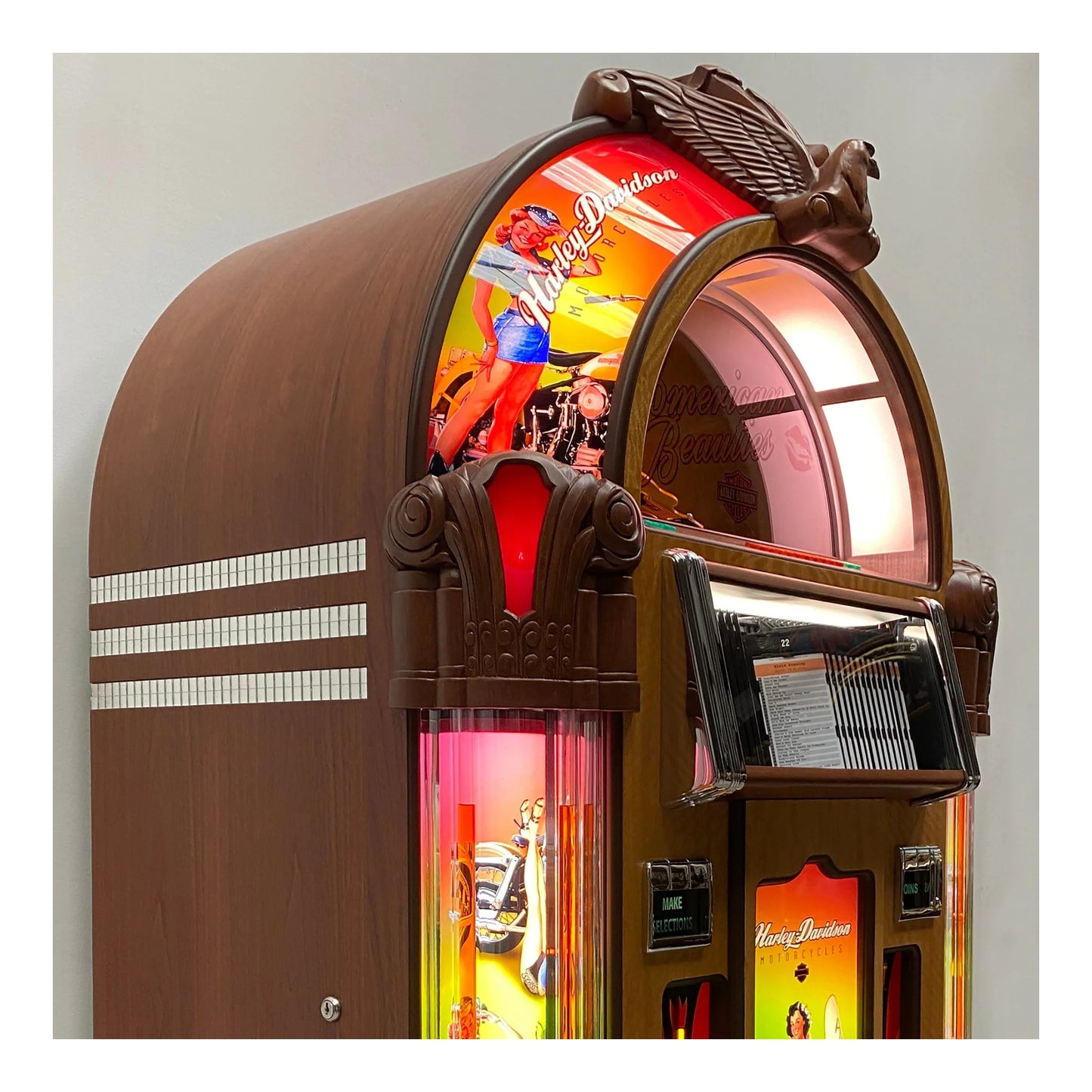 Vintage-style jukebox with colorful display and 'Harley Davidson' branding.