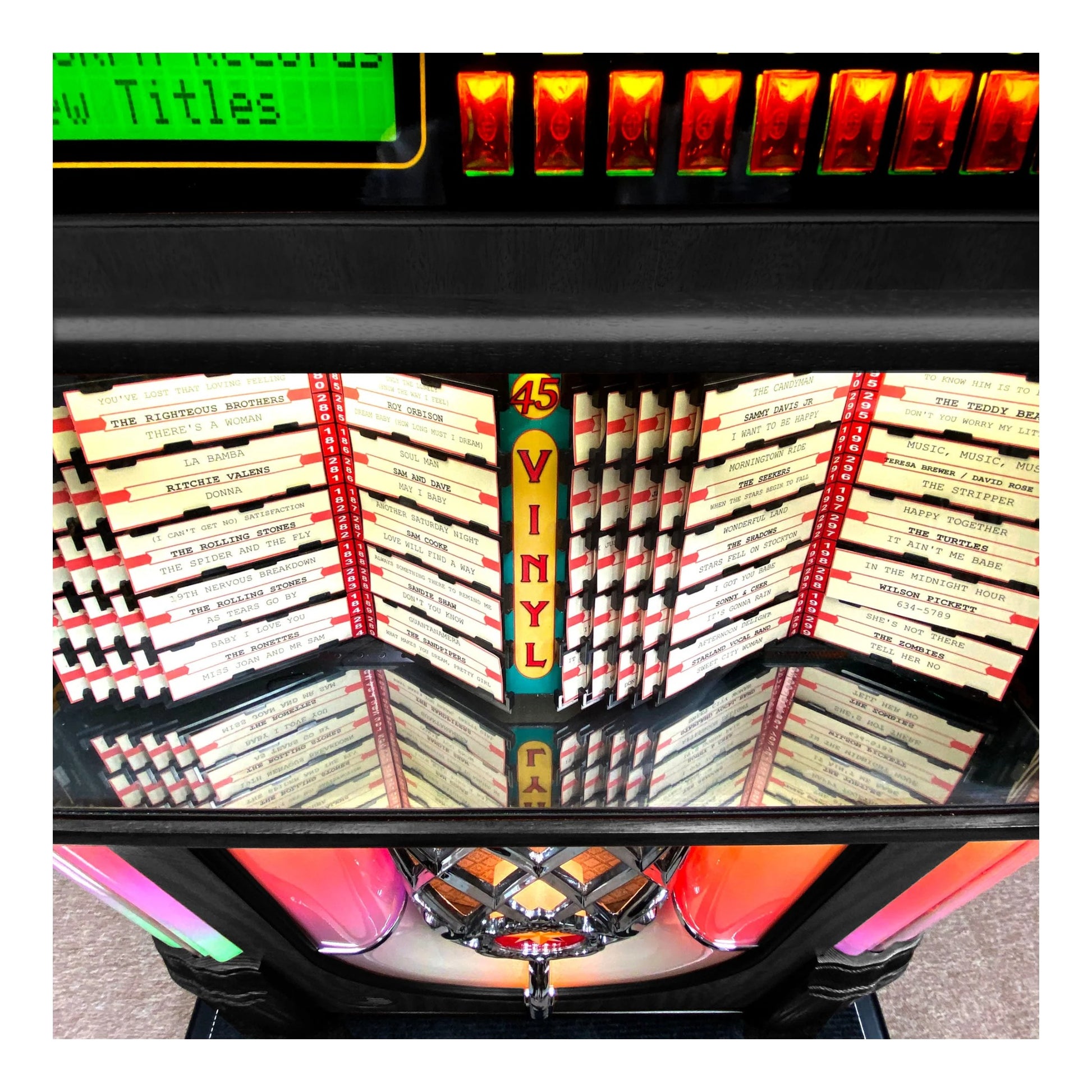 Vintage-style jukebox with vinyl records and colorful lights