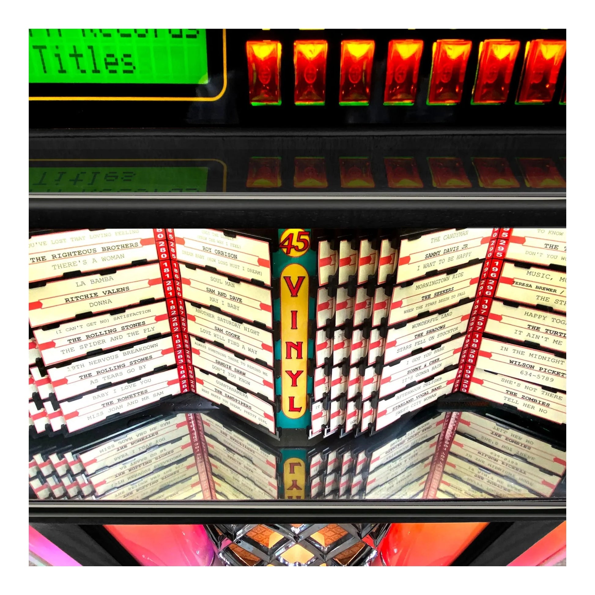 Jukebox with vinyl records and a colorful display.