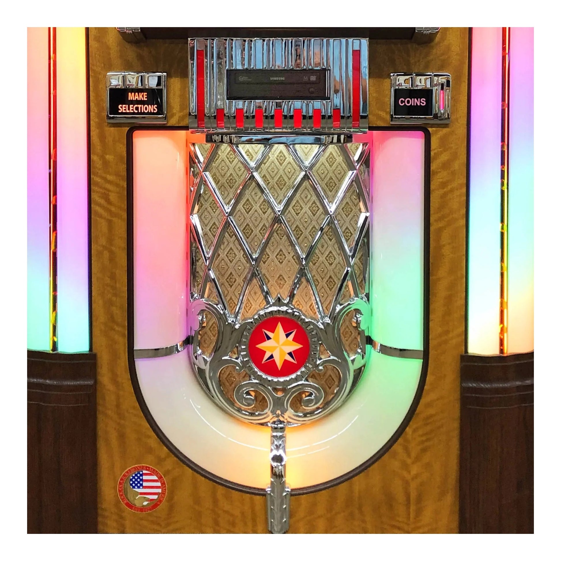 Vintage-style jukebox with wooden exterior and metallic top panel.
