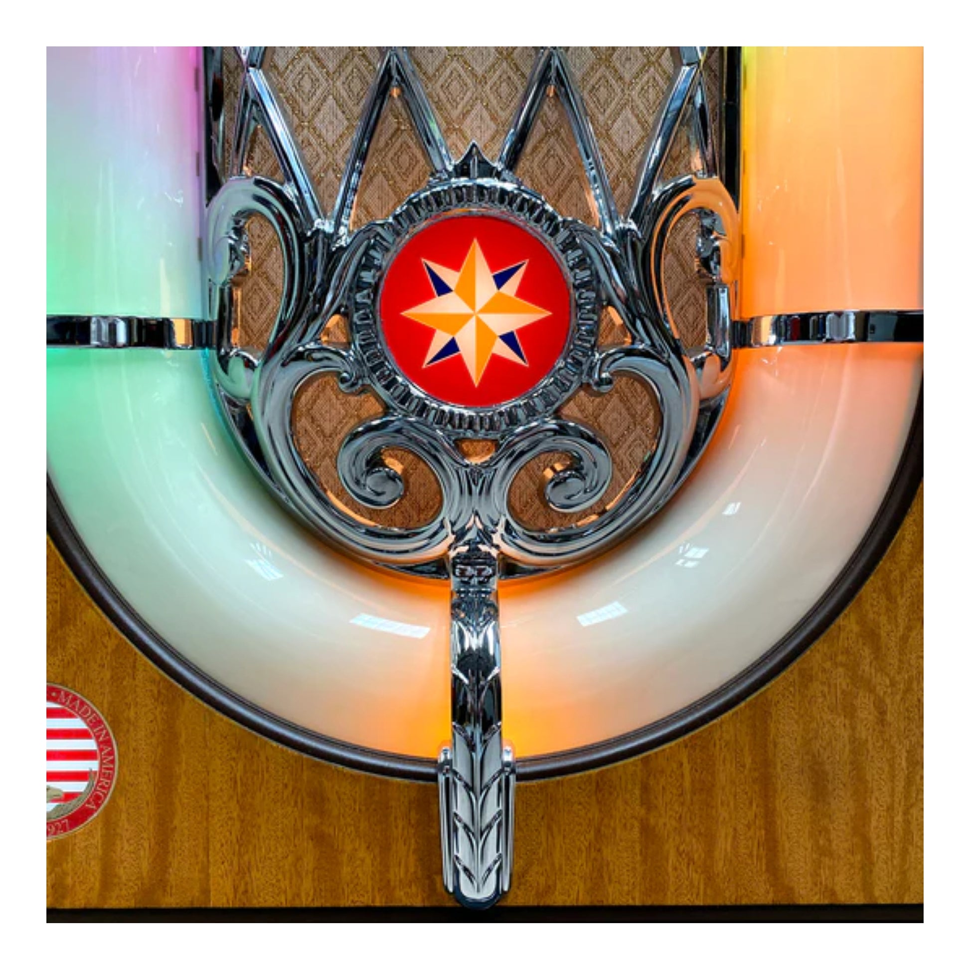 Decorative metal wall piece with star design on a wooden background