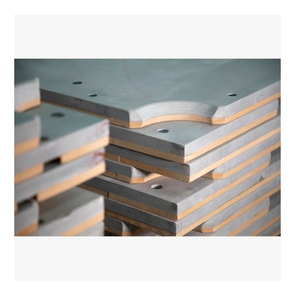 Stack of concrete or similar material slabs with a gray and brown color scheme.